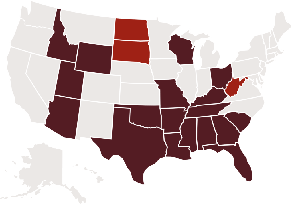 A map showing that Idaho, Texas, Florida, South Carolina, Georgia, Mississippi, Louisiana, Arkansas, Wyoming, Utah, Alabama, Arizona, Oklahoma, Tennessee, Kentucky, Missouri, Ohio, and Wisconsin have abortion bans and new voter suppression laws. North Dakota and South Dakota have abortion bans.